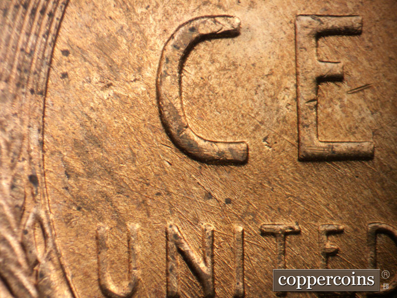Die-stage B marker on 1957D•1MM•096 (1957 Repunched Mint Mark).