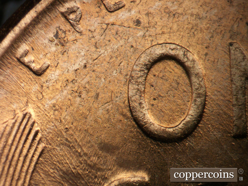 Die-stage B marker on 1957D•1MM•097 (1957 Repunched Mint Mark).