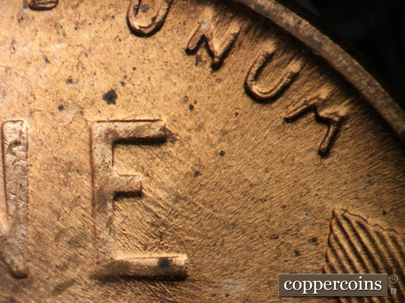 Die-stage B marker on 1957D•1MM•097 (1957 Repunched Mint Mark).