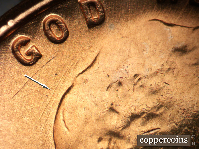 Die-stage B marker on 1957D•1MM•098 (1957 Repunched Mint Mark).