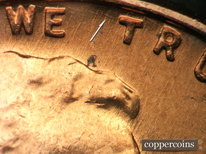 Die-stage B marker on 1957D•1MM•098 (1957 Repunched Mint Mark).