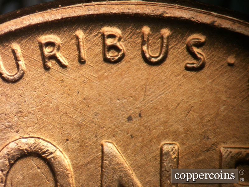 Die-stage B marker on 1957D•1MM•098 (1957 Repunched Mint Mark).