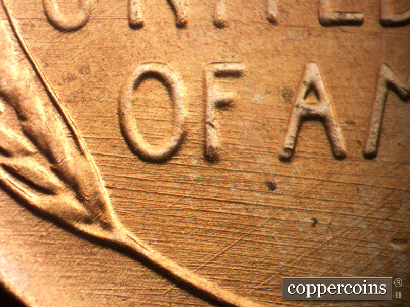 Die-stage B marker on 1957D•1MM•098 (1957 Repunched Mint Mark).