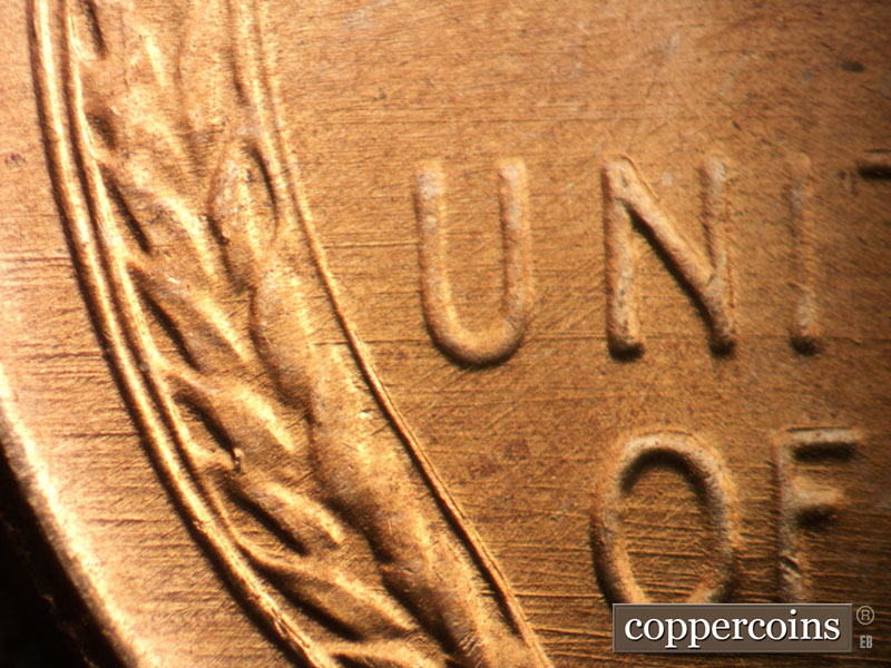 Die-stage B marker on 1957D•1MM•098 (1957 Repunched Mint Mark).