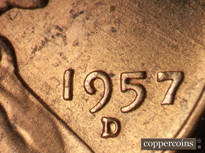 Die-stage B marker on 1957D•1MM•099 (1957 Repunched Mint Mark).