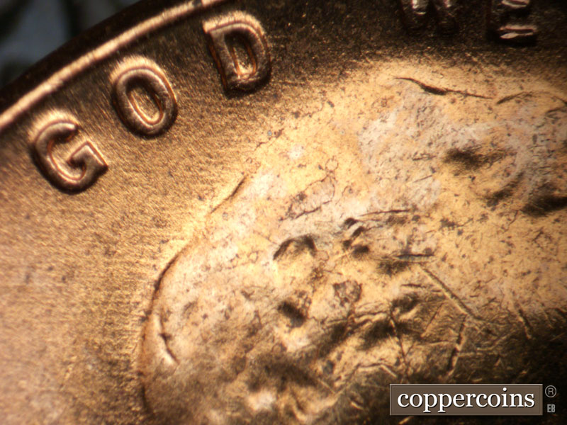 Die-stage B marker on 1957D•1MM•099 (1957 Repunched Mint Mark).