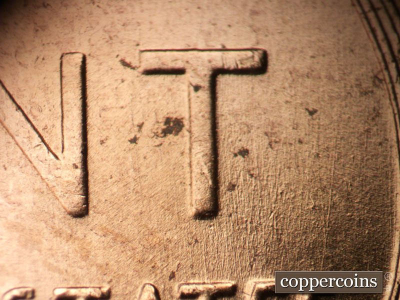 Die-stage A marker on 1957D•1MM•101 (1957 Repunched Mint Mark).