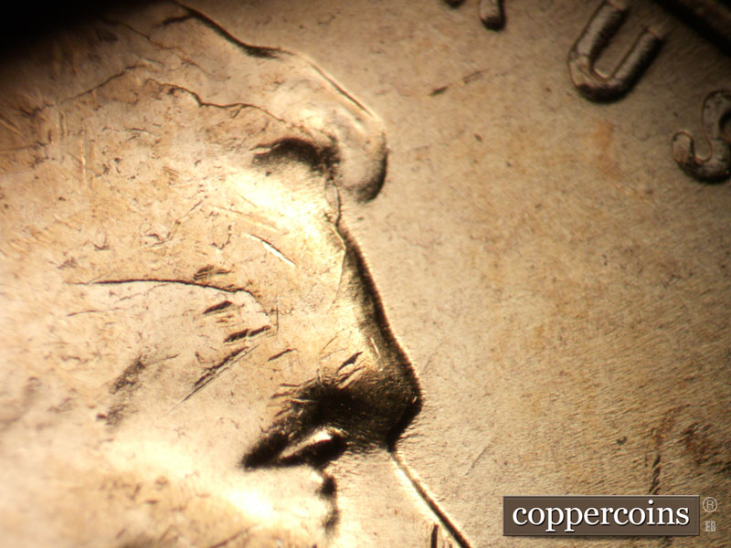 Die-stage C marker on 1957D•1MM•102 (1957 Repunched Mint Mark).