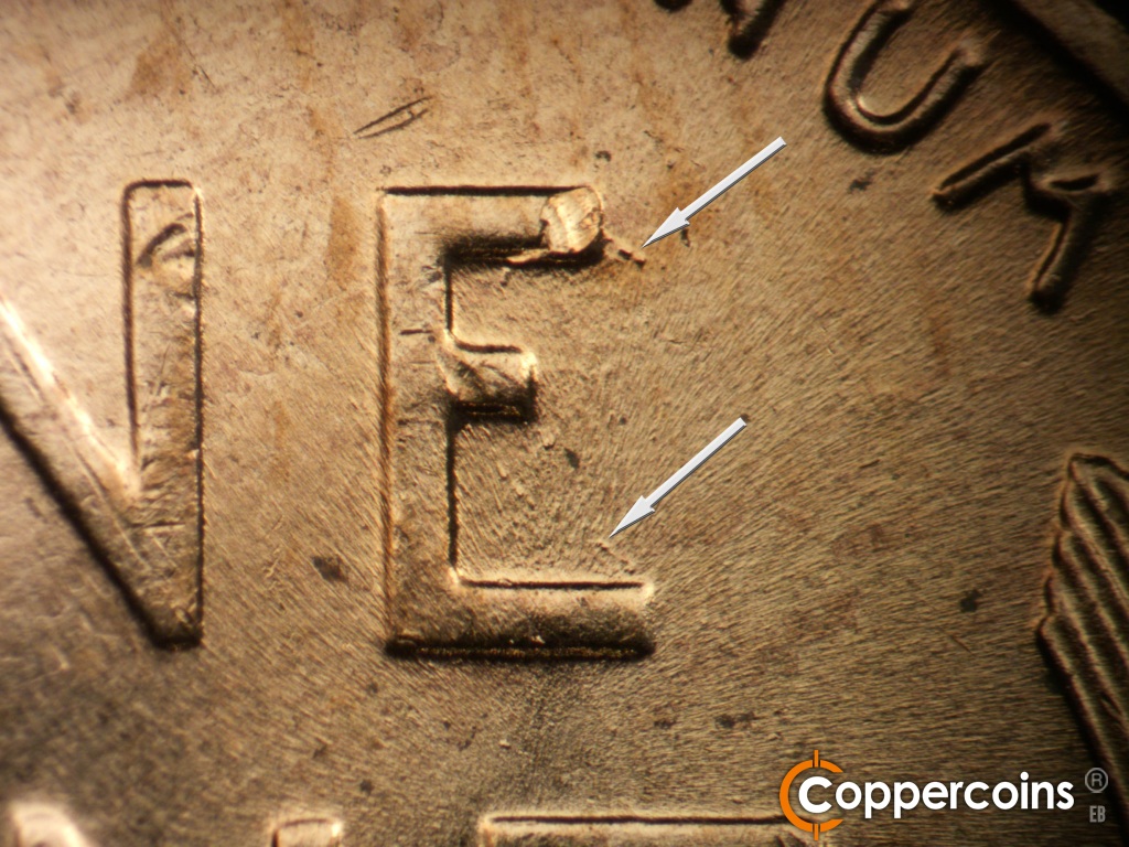 Die-stage B marker on 1957D•1MM•107 showing Die gouges on upper E and lower E in ONE.