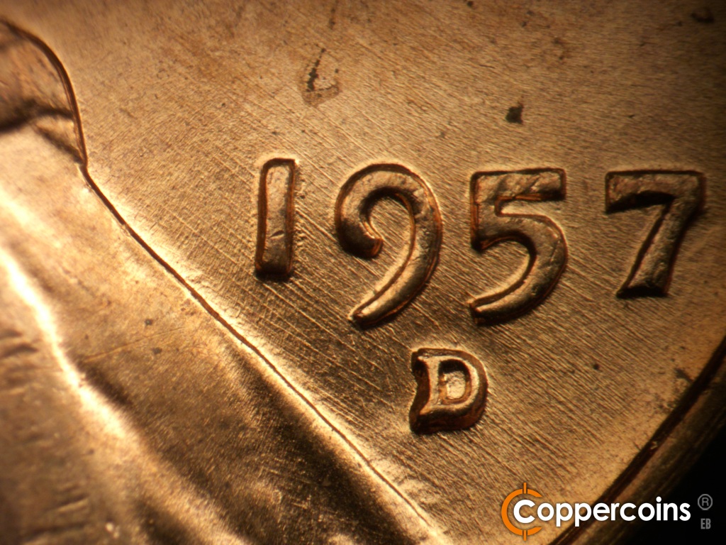 Die-stage B marker on 1957D•1MM•109 showing SE die scratches through date.