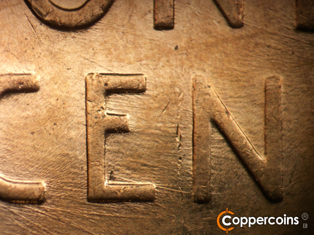 Die-stage C marker on 1957D•1MM•110 showing Die scratches through E in CENT.
