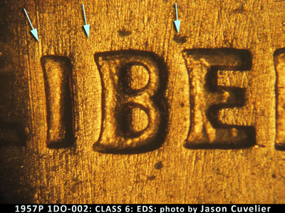 Die-stage A marker on 1957P•1DO•002 (1957 Doubled Die Obverse).