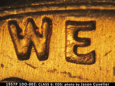 Die-stage A marker on 1957P•1DO•002 (1957 Doubled Die Obverse).