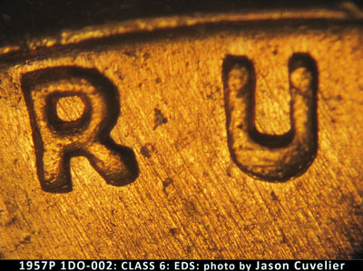 Die-stage A marker on 1957P•1DO•002 (1957 Doubled Die Obverse).