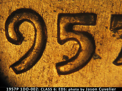 Die-stage A marker on 1957P•1DO•002 (1957 Doubled Die Obverse).