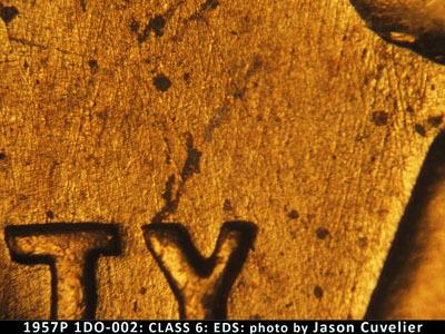 Die-stage A marker on 1957P•1DO•002 (1957 Doubled Die Obverse).