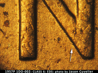 Die-stage A marker on 1957P•1DO•002 (1957 Doubled Die Obverse).