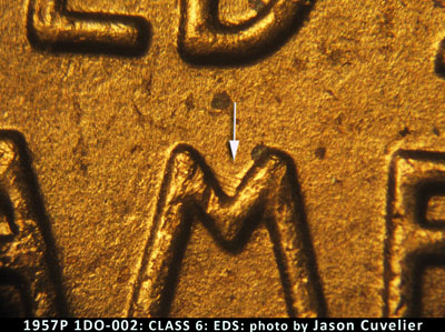 Die-stage A marker on 1957P•1DO•002 (1957 Doubled Die Obverse).