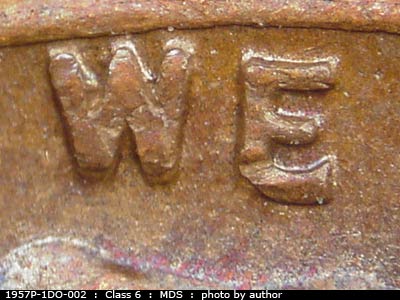 Die-stage B marker on 1957P•1DO•002 (1957 Doubled Die Obverse).