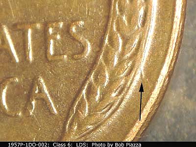 Die-stage C marker on 1957P•1DO•002 (1957 Doubled Die Obverse).