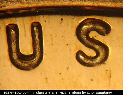Die-stage B marker on 1957P•1DO•004P (1957 Doubled Die Obverse).