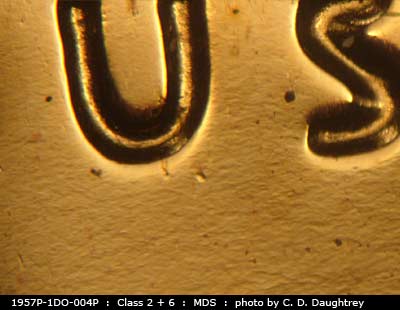 Die-stage B marker on 1957P•1DO•004P (1957 Doubled Die Obverse).