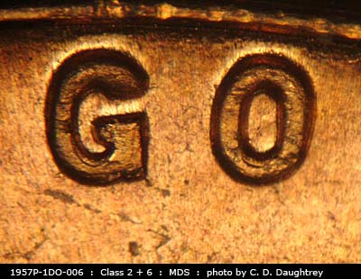 Die-stage B marker on 1957P•1DO•006 (1957 Doubled Die Obverse).