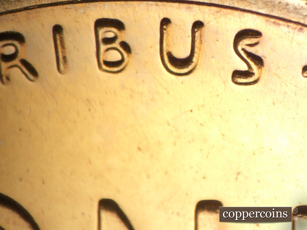 Die-stage A marker on 1957P•1DR•004P showing Light doubling on PLURIBUS.