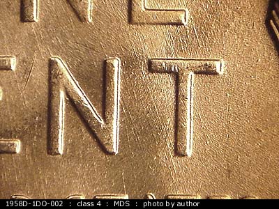 Die-stage B marker on 1958D•1DO•002 (1958 Doubled Die Obverse).