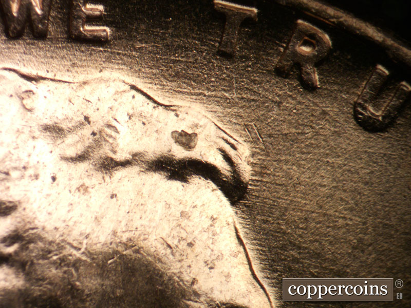 Die-stage B marker on 1958D•1DO•003 (1958 Doubled Die Obverse).