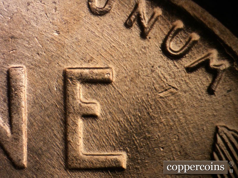 Die-stage B marker on 1958D•1DO•003 (1958 Doubled Die Obverse).