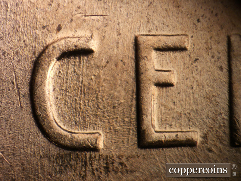 Die-stage B marker on 1958D•1DO•003 (1958 Doubled Die Obverse).