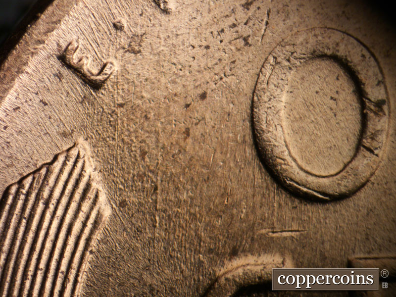 Die-stage B marker on 1958D•1DO•003 (1958 Doubled Die Obverse).