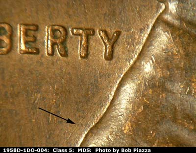 Die-stage B marker on 1958D•1DO•004 (1958 Doubled Die Obverse).