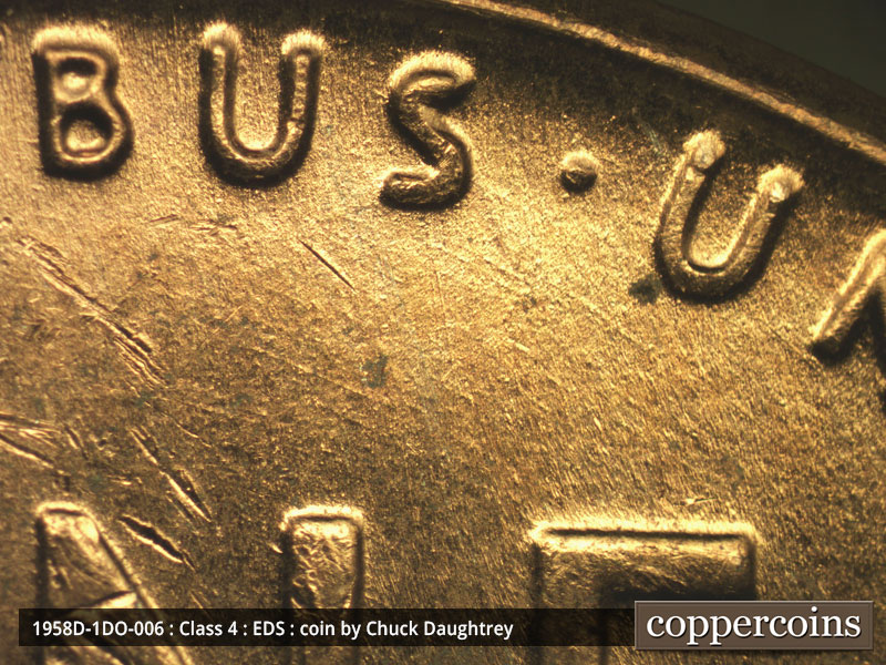 Die-stage A marker on 1958D•1DO•006 (1958 Doubled Die Obverse).