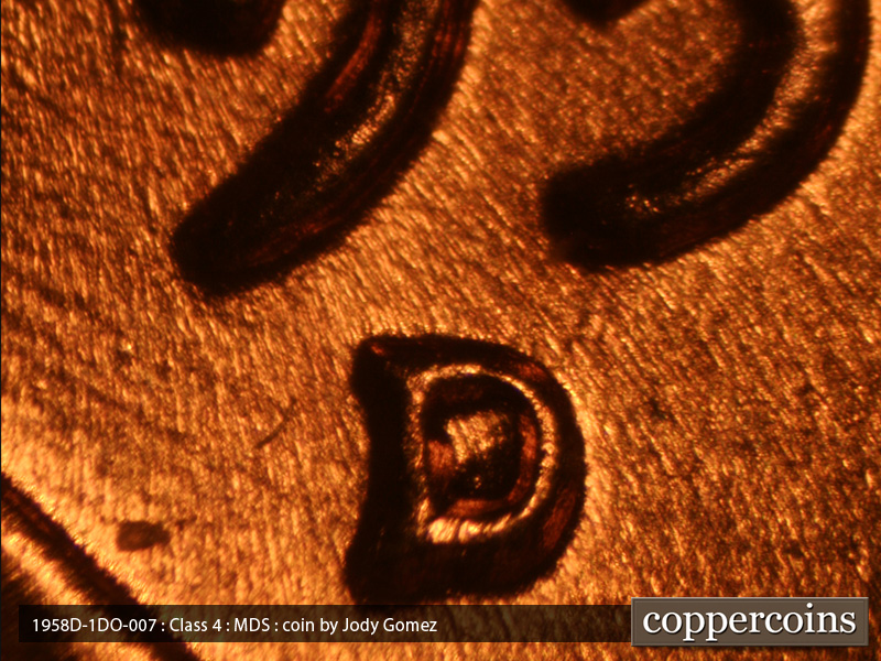 Die-stage B marker on 1958D•1DO•007 (1958 Doubled Die Obverse).