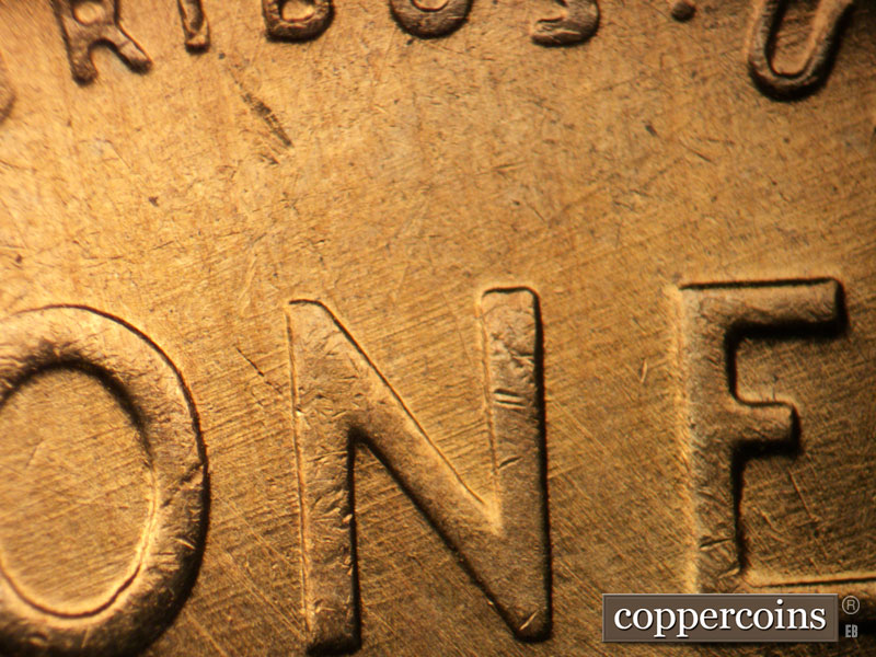 Die-stage B marker on 1958D•1DO•010 (1958 Doubled Die Obverse).