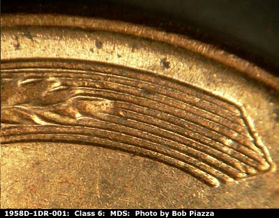 Die-stage B marker on 1958D•1DR•001 (1958 Doubled Die Reverse).