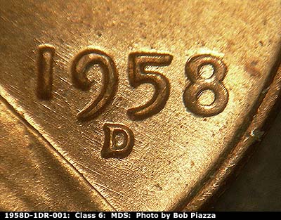 Die-stage B marker on 1958D•1DR•001 (1958 Doubled Die Reverse).