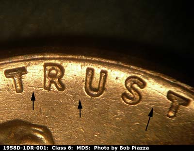 Die-stage B marker on 1958D•1DR•001 (1958 Doubled Die Reverse).
