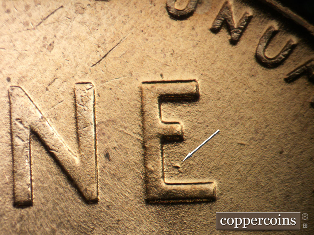 Die-stage B marker on 1958D•1MM•002 (1958 Repunched Mint Mark).