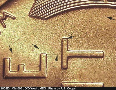 Die-stage B marker on 1958D•1MM•003 (1958 Repunched Mint Mark).
