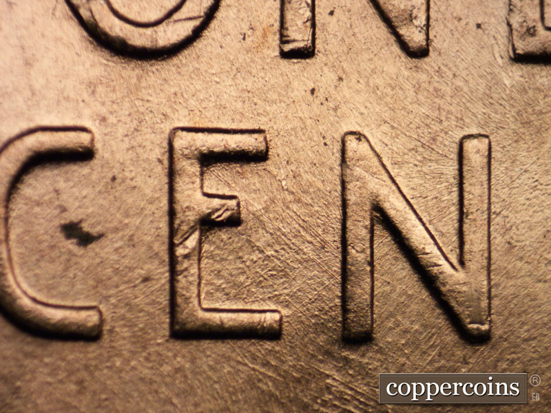 Die-stage B marker on 1958D•1MM•004 (1958 Repunched Mint Mark).