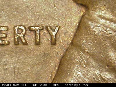 Die-stage B marker on 1958D•1MM•005 (1958 Repunched Mint Mark).