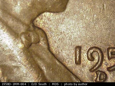 Die-stage B marker on 1958D•1MM•005 (1958 Repunched Mint Mark).