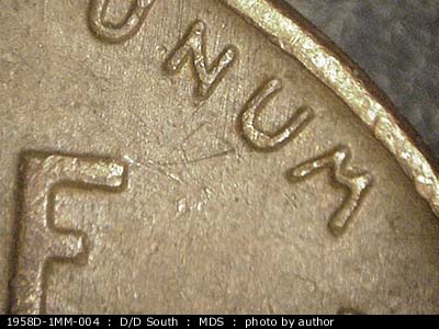 Die-stage B marker on 1958D•1MM•005 (1958 Repunched Mint Mark).
