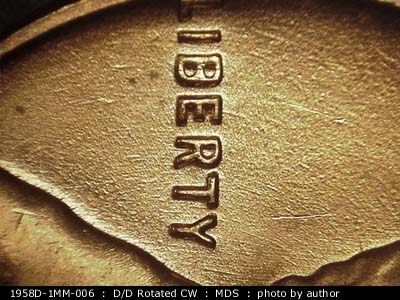 Die-stage B marker on 1958D•1MM•006 (1958 Repunched Mint Mark).