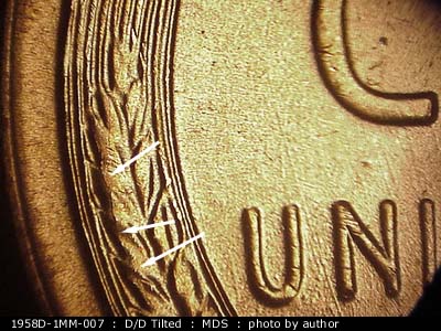 Die-stage B marker on 1958D•1MM•007 (1958 Repunched Mint Mark).