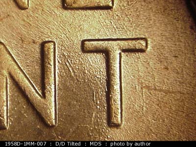 Die-stage B marker on 1958D•1MM•007 (1958 Repunched Mint Mark).