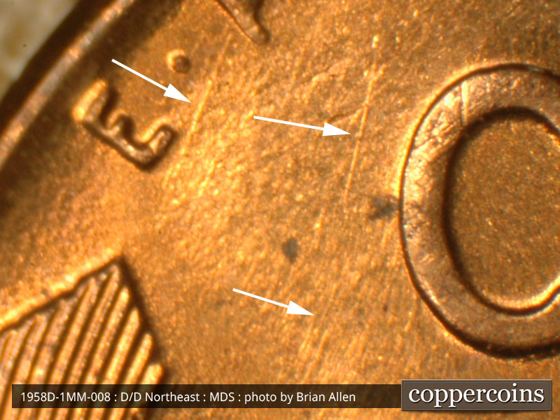 Die-stage B marker on 1958D•1MM•008 (1958 Repunched Mint Mark).